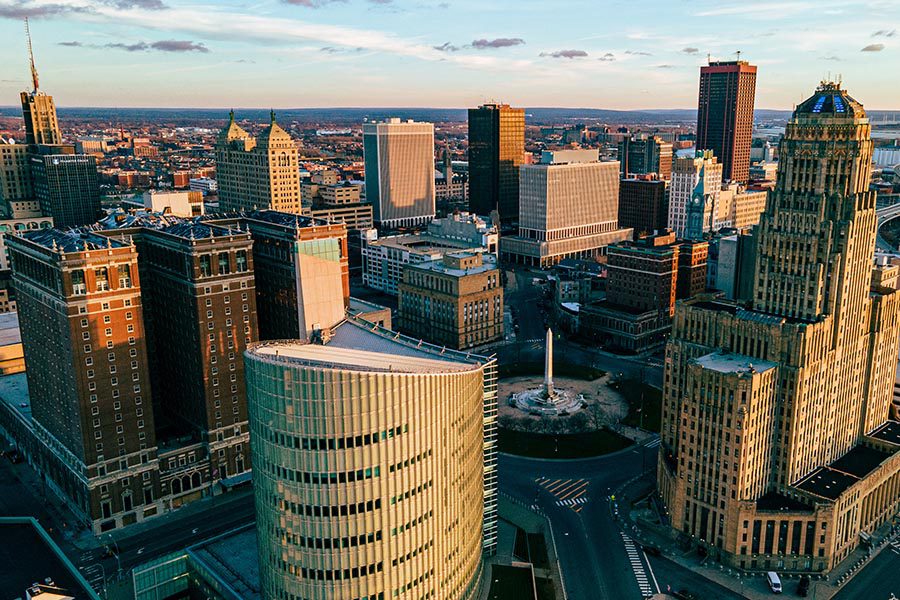 About Our Agency - Aerial View of Buffalo, NY Skyline at Dusk